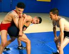 Three hot jocks wrestle and fuck in the college gym