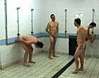 A group of interracial boys at the public shower